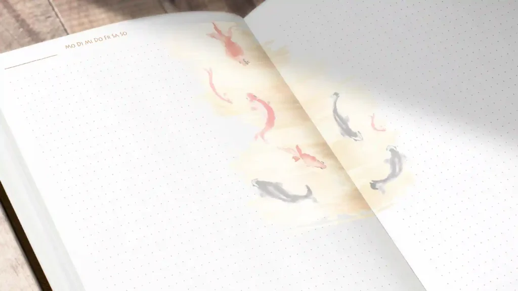 Warum du ein hochwertiges Tagebuch nutzen solltest, illustriert mit Goldfischen